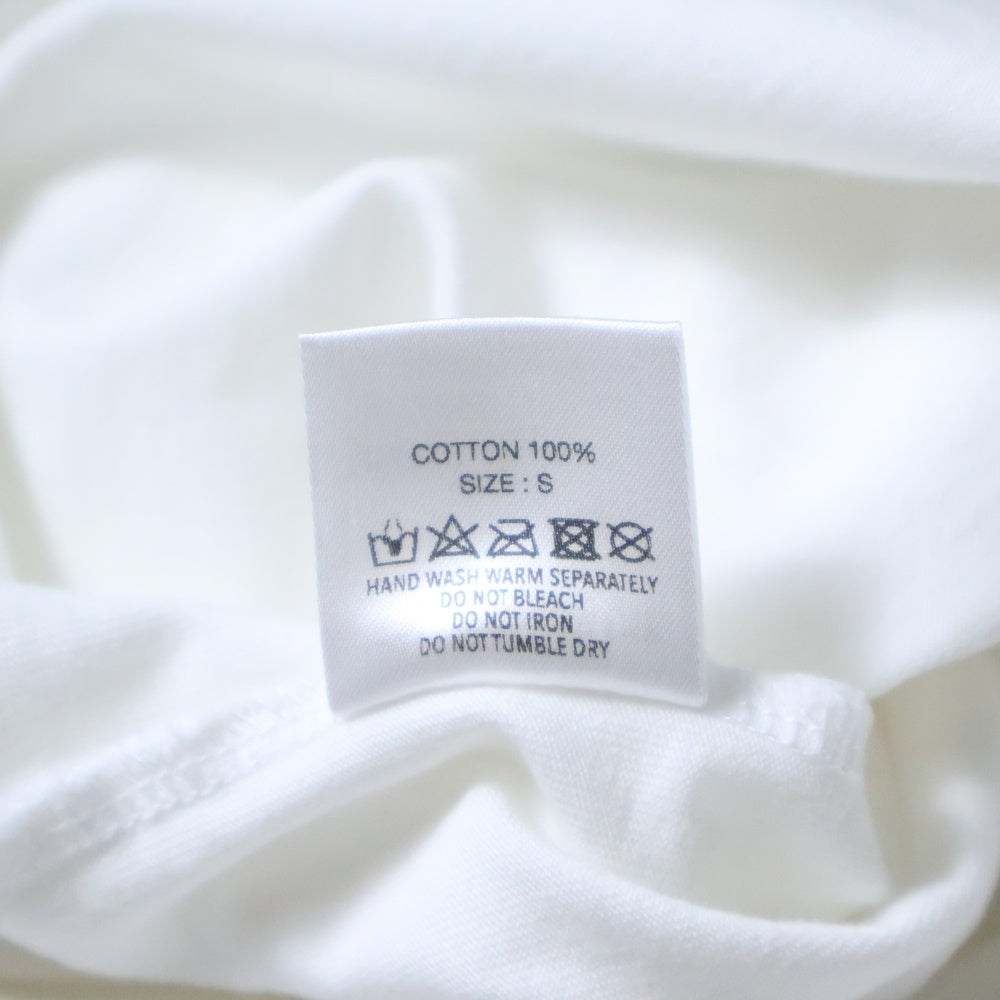 GOD SELECTION XXX(ゴッドセレクショントリプルエックス) WANT TO HURT ME フロントアームプリント クルーネック コットン 長袖Tシャツ カットソー ホワイト