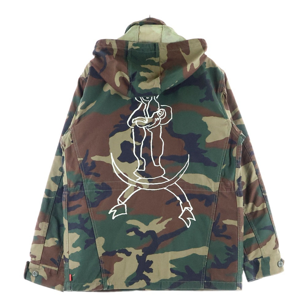 SUPREME(シュプリーム) 12AW ×Mark Gonzales M-51 Jacket マークゴンザレス ウッドランドカモ バックイラストプリント ライナー付 フーデッドミリタリージャケット グリーン/ブラウン