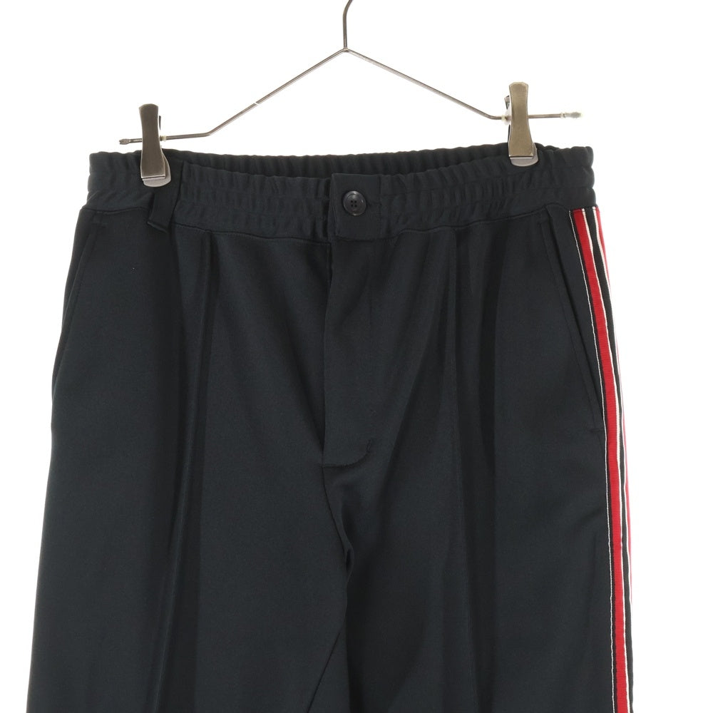 ISAMU KATAYAMA BACKLASH(イサムカタヤマバックラッシュ) POLYESTER-JERSEY TRACK PANTS ポリエステル ジャージー トラックパンツ ブラック/レッド 2054-01