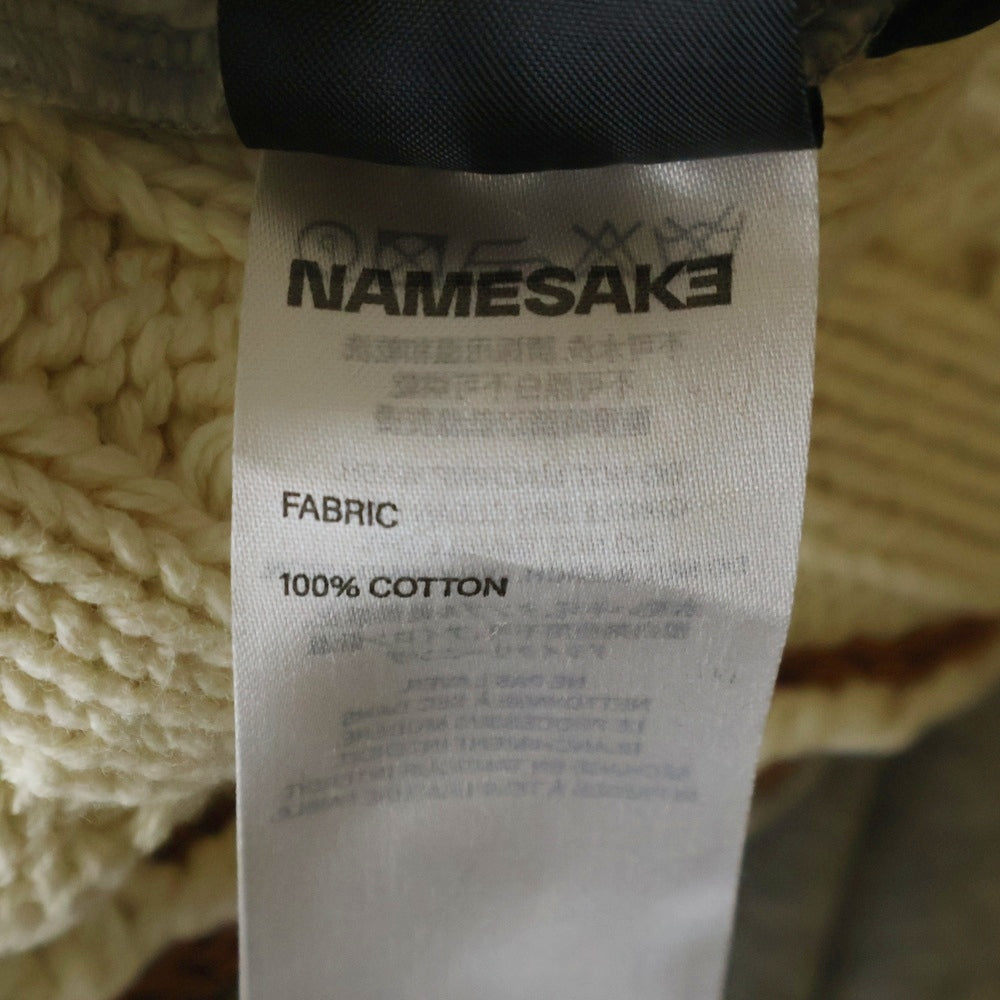 NAMESAKE(ナメサケ) 23AW IVY SLEEVELESS HOODIE フロントプリント スウェットニット切替デザイン スリーブレスプルオーバーパーカー フーディー グレー/ベージュ