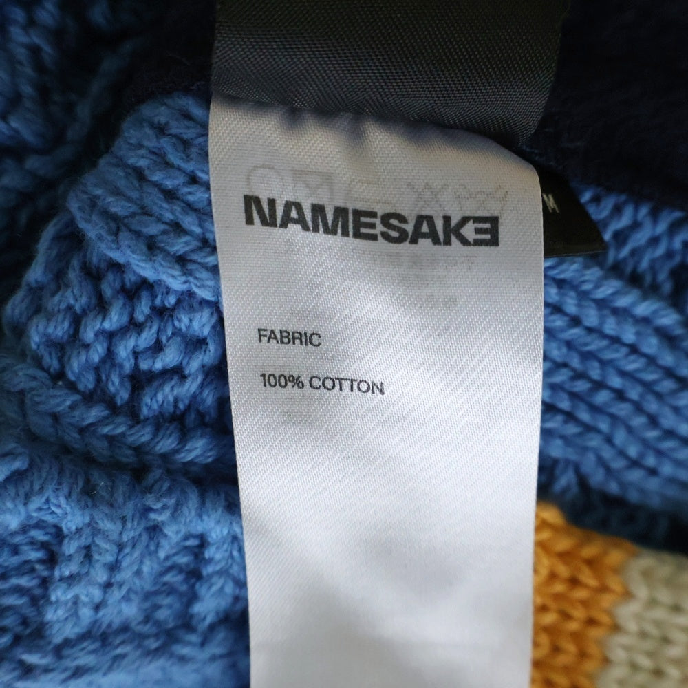 NAMESAKE(ナメサケ) 23AW IVY SLEEVELESS HOODIE フロントプリント スウェットニット切替デザイン スリーブレスプルオーバーパーカー フーディー ネイビー/ブルー