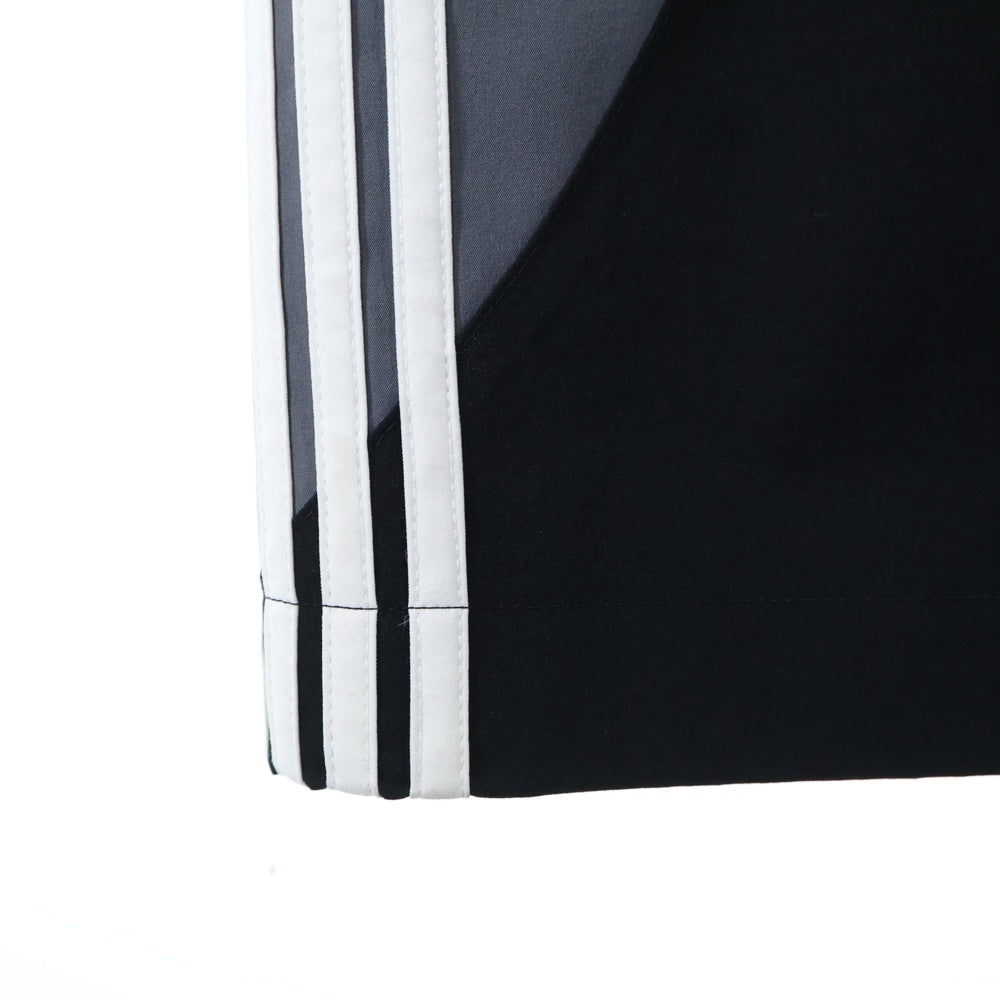 BALENCIAGA(バレンシアガ) 24AW CUT-UP TRACKSUIT PANTS ループスポーツロゴ カットアップ レイヤード トラックスーツパンツ ブラック/ネイビー 808909 TR031