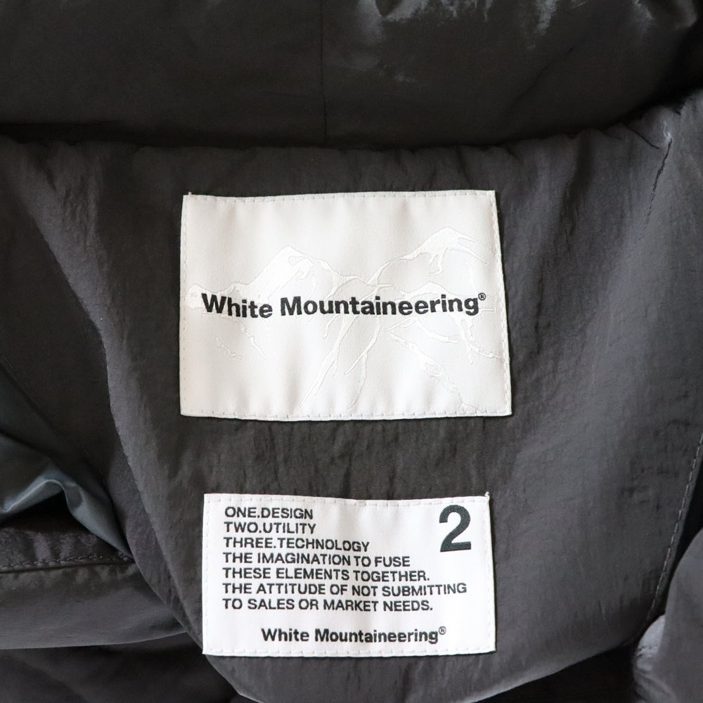 White Mountaineering(ホワイトマウンテニアリング) ×TAION QUILTED HANTEN タイオン キルテッド ハンテン ノーカラー ナイロンダウンジャケット チャコールグレー WM2273217
