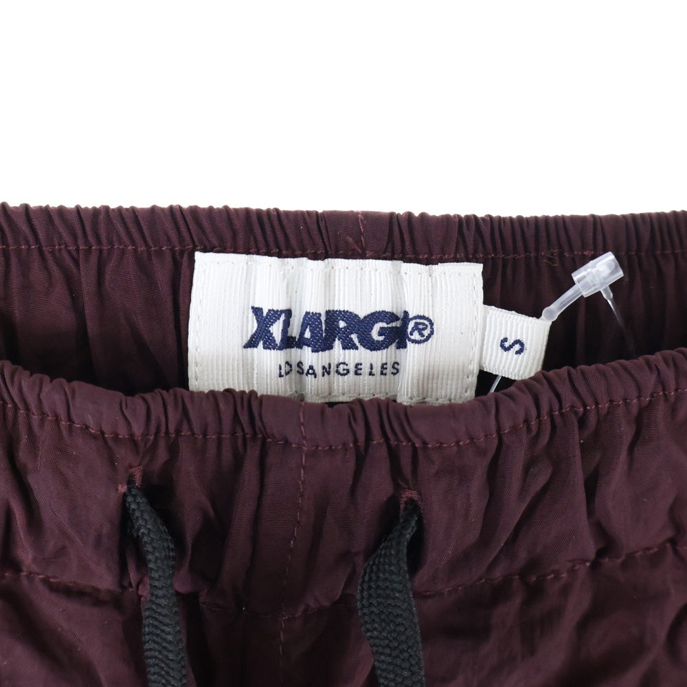X-LARGE(エクストララージ) TRACK PANT サイドライン ドローストリング ナイロン トラックパンツ バーガンディー 01183606