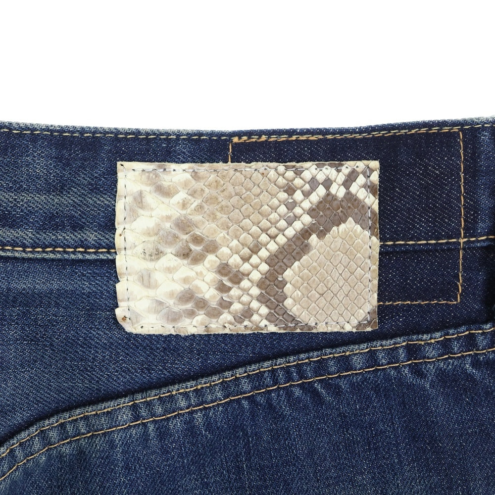 VISVIM(ヴィスヴィム) FLUXUS 03D2.5 SERGE DE NIMES パイソンパッチ ダメージ加工 セルビッチ デニムパンツ インディゴ