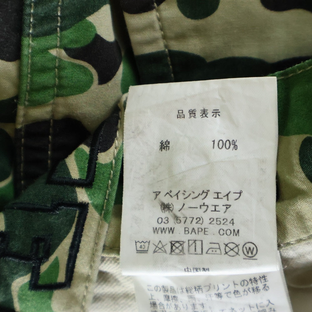 A BATHING APE(アベイシングエイプ) ×UNDEFEATED ABC 6POCKET PANTS アンディフィーテッド ABCカモ柄 総柄 マルチポケット ジップアップ カーゴパンツ グリーン 001PTE231903X
