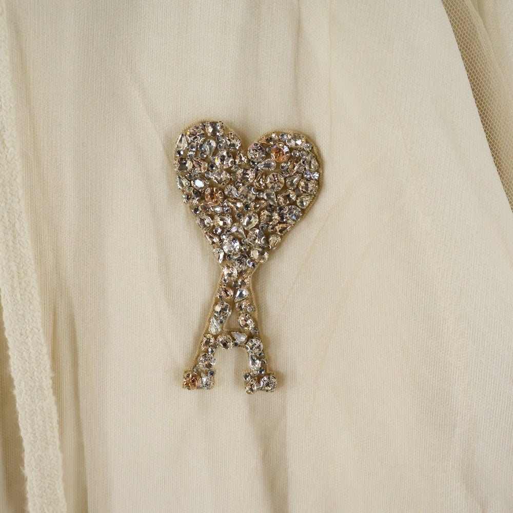 AMI Alexandre Mattiussi(アミアレクサンドルマテュッシ) ラメハートロゴ チュールレイヤード プルオーバースウェットパーカー レディース ベージュ USW221.PA0018