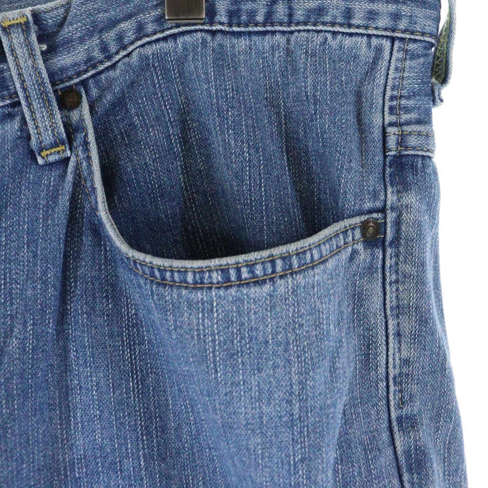 Wrangler(ラングラー) ブラウンロゴパッチ ボタンフライ ストレートデニムパンツ インディゴブルー W0383