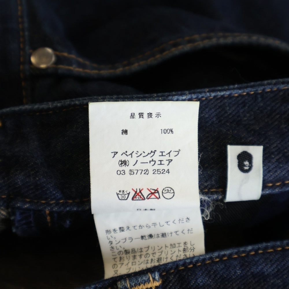 A BATHING APE(アベイシングエイプ) バックポケットカモ柄エイプヘッドプリント ジップフライデニムパンツ インディゴ