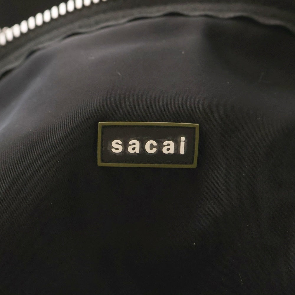 Sacai(サカイ) 24SS POCKET BACK PACK ロゴラバーパッチ ナイロン切替 ポケット バックパック リュックサック ブラック 24-0695S