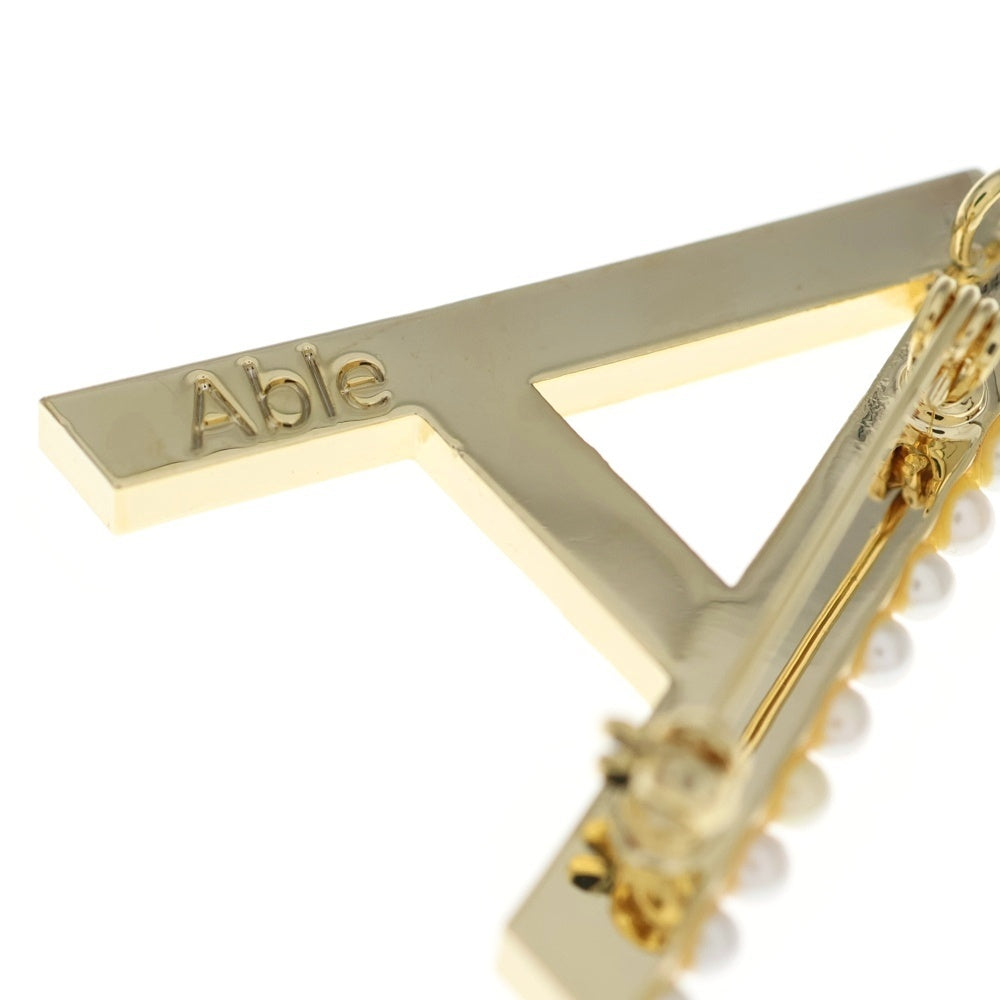 STELLAR HOLLYWOOD(ステラハリウッド) パールドット イニシャルブローチ ゴールド レディース