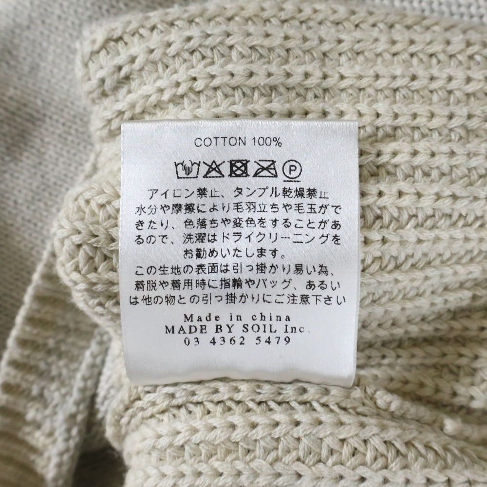 A GOOD BAD INFLUENCE(アグッドバッドインフレンス) クレイジーパターン バックロゴデザイン モックネック ニット セーター ベージュ