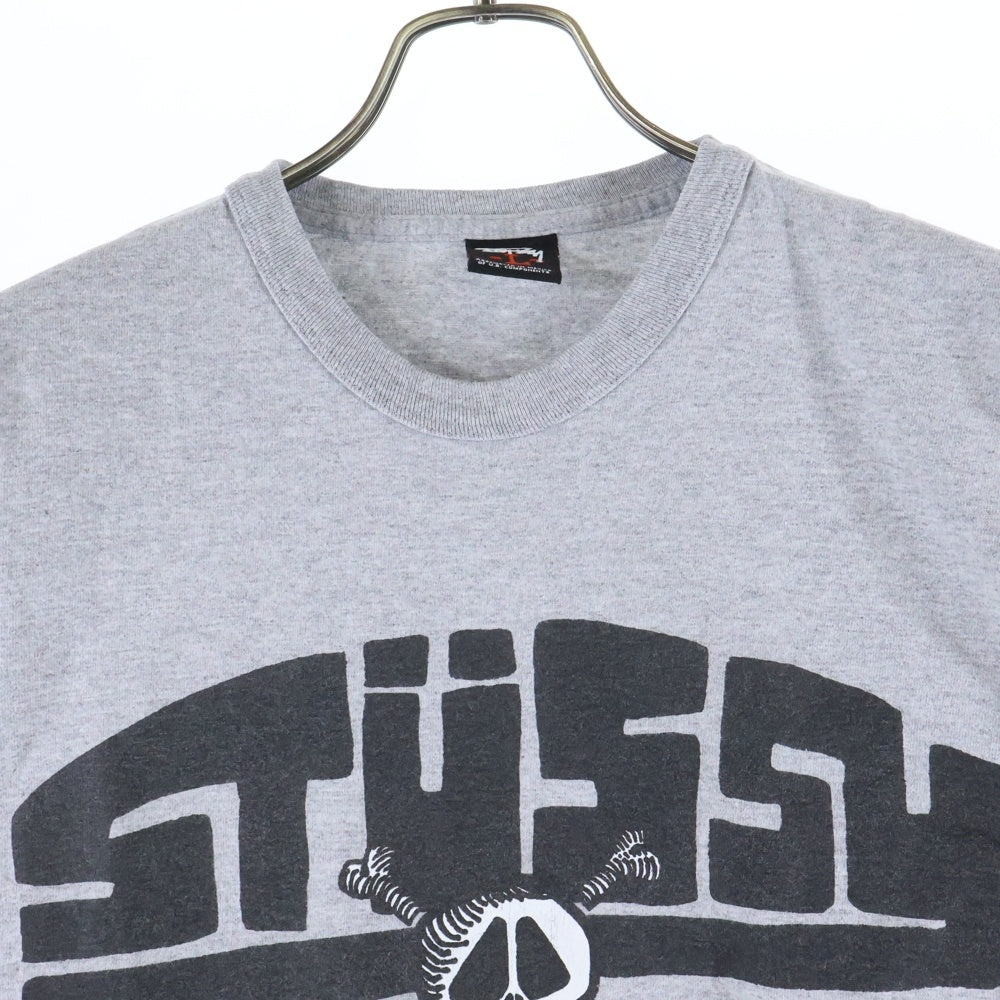 STUSSY(ステューシー) SKULL LOGO L/S TEE スカル フロントロゴプリントTシャツ メキシコ製 長袖クルーネックカットソー グレー