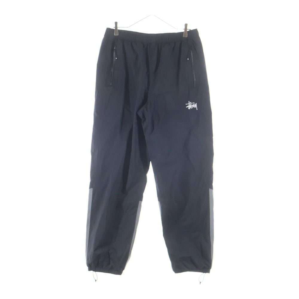 STUSSY(ステューシー) フロントロゴデザイン マルチポケット ドローストリング ナイロンパンツ ブラック