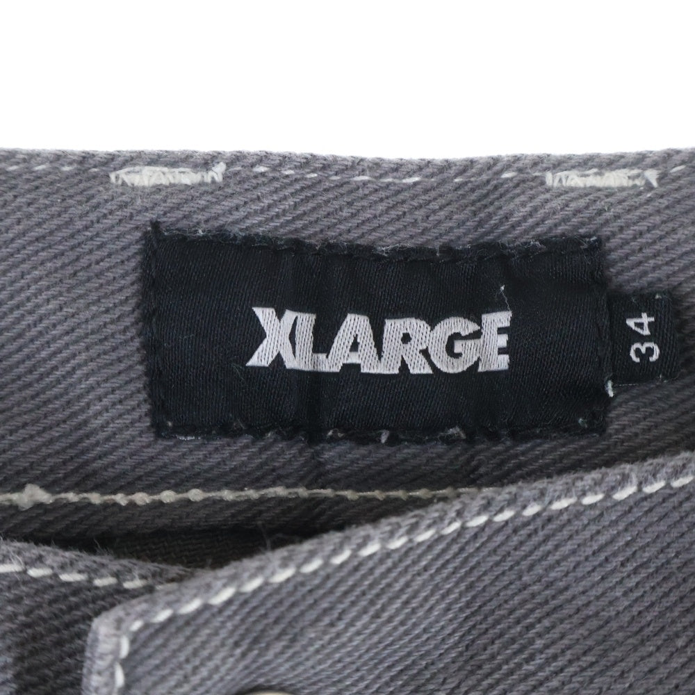 X-LARGE(エクストララージ) EMBROIDERED OVER-DYE WORK PANTS 刺繍デザイン デニム ペインターワークパンツ グレー 101223031021