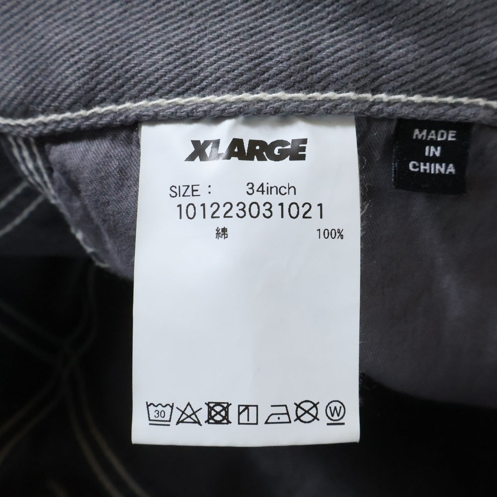 X-LARGE(エクストララージ) EMBROIDERED OVER-DYE WORK PANTS 刺繍デザイン デニム ペインターワークパンツ グレー 101223031021