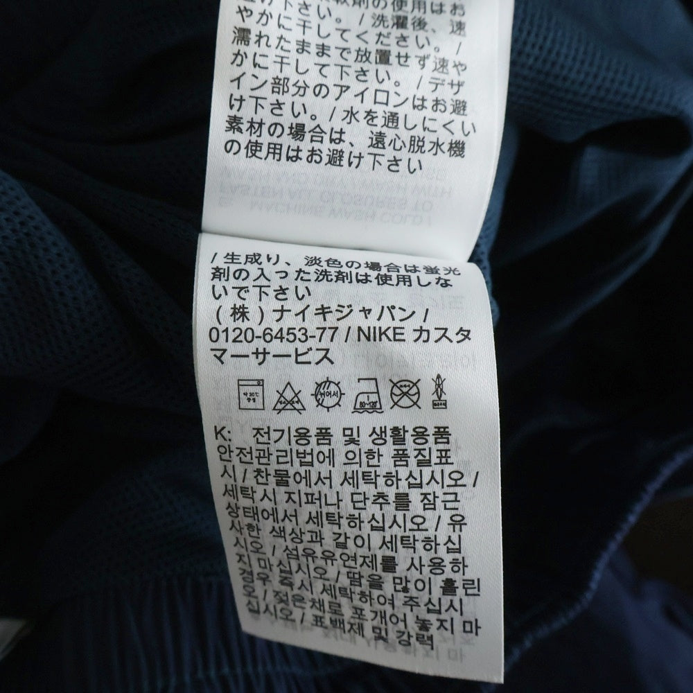 NIKE(ナイキ) LNSWESS OS ロゴ刺繍 ウーブン ナイロン ジョガーパンツ ネイビー レディース FV7669-478