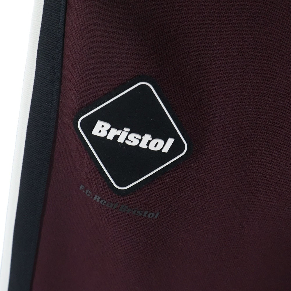 F.C.R.B./F.C.Real Bristol/FCRB(エフシーアールビー/エフシーレアルブリストル) 25AW TRAINING TRACK PANTS ロゴパッチ サイドライン トレーニング トラックパンツ ワインレッド FCRB-252085
