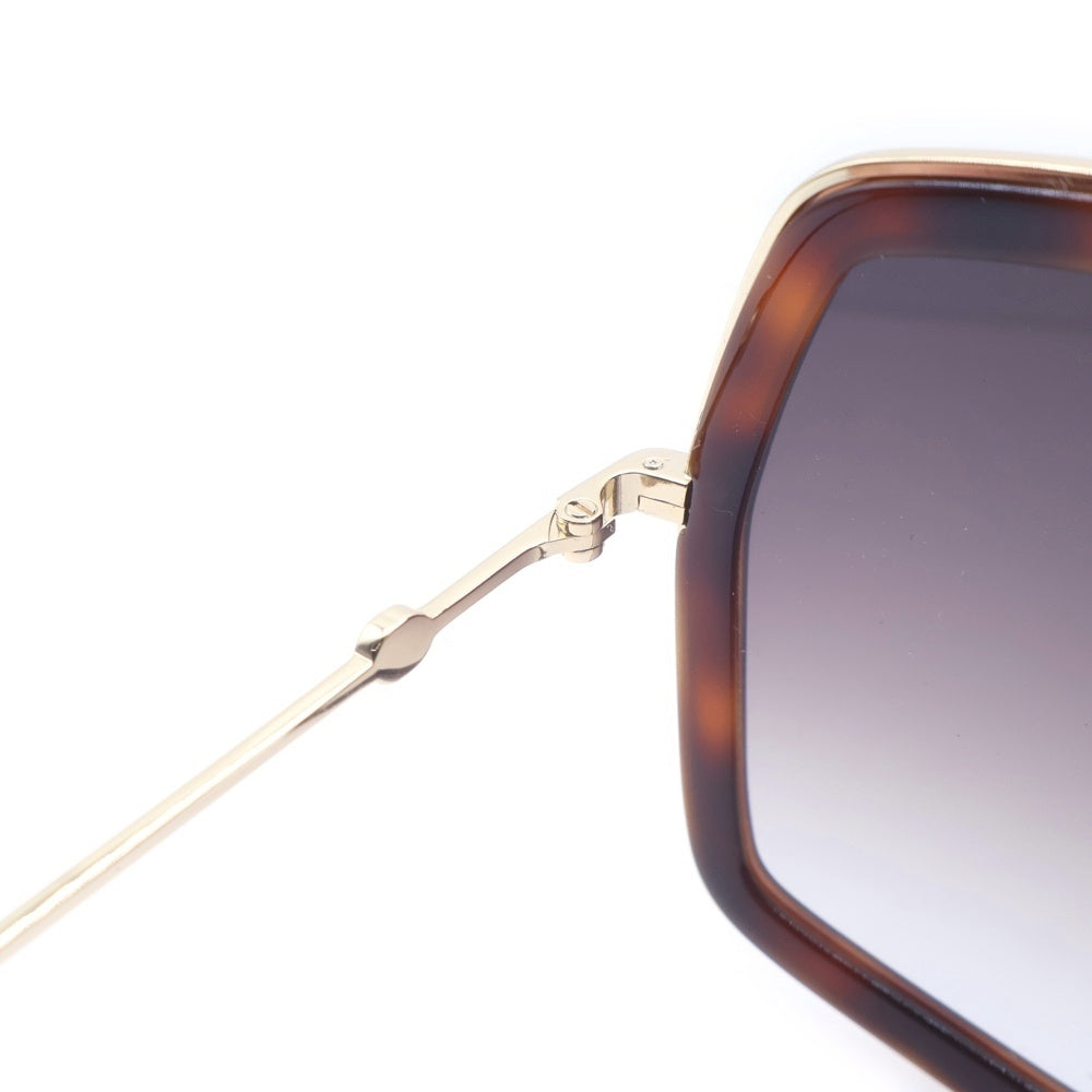GUCCI(グッチ) インターロッキングロゴ ヘキサゴンフレーム カラーレンズサングラス 眼鏡 アイウェア ゴールド/ブラウン GG0106S レディース