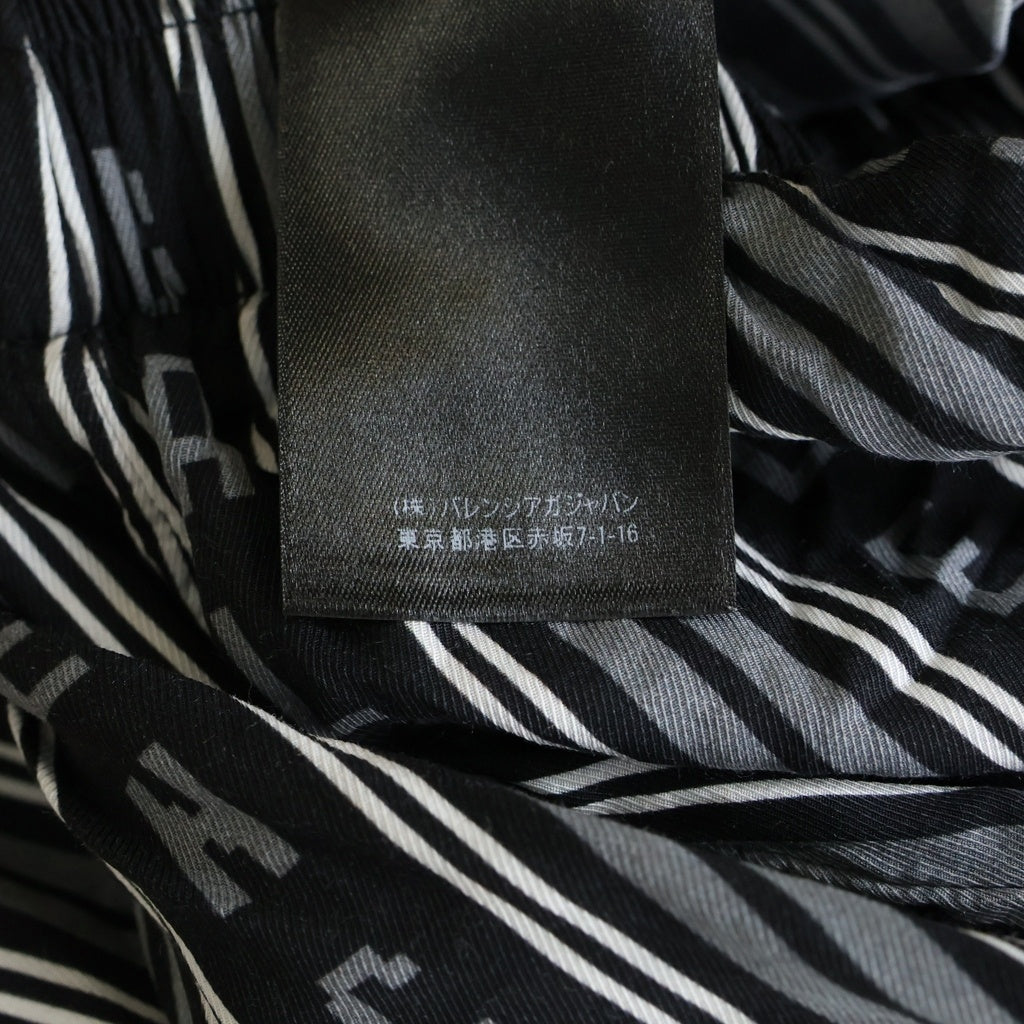 BALENCIAGA(バレンシアガ) 23SS HOMEWEAR ホームウェア ロゴ総柄 レーヨン ドローストリング イージーパンツ ブラック 658883 TKL32