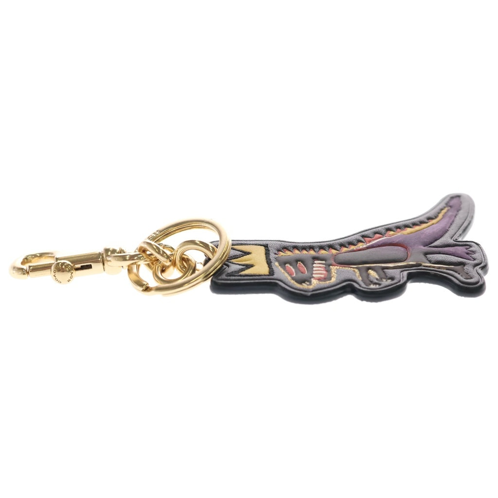 COACH(コーチ) ×JEAN MICHEL BASQUIAT REXY BAG CHARM バスキア 恐竜 バッグチャーム キーホルダー ブラック/ベージュ C5704 レディース