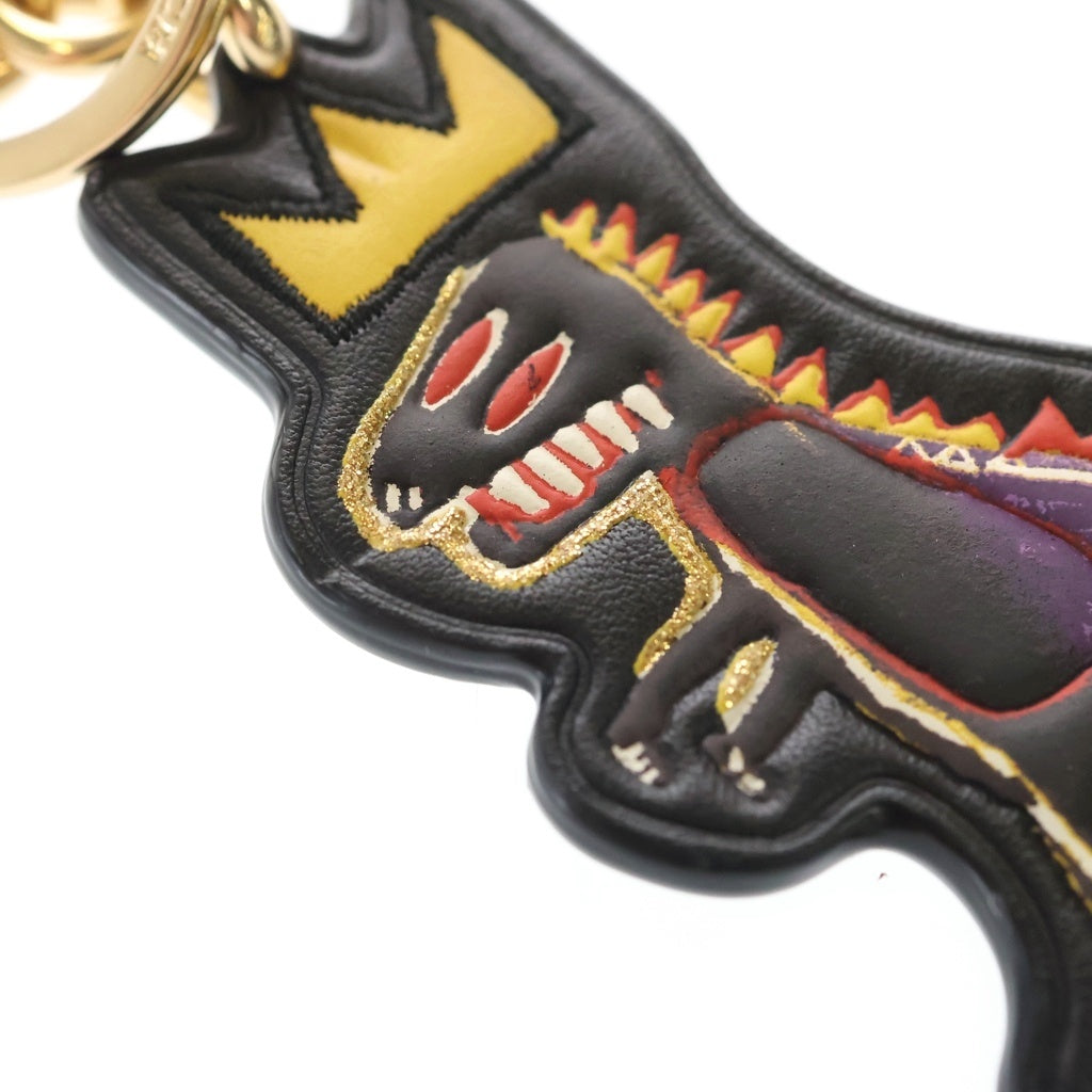 COACH(コーチ) ×JEAN MICHEL BASQUIAT REXY BAG CHARM バスキア 恐竜 バッグチャーム キーホルダー ブラック/ベージュ C5704 レディース