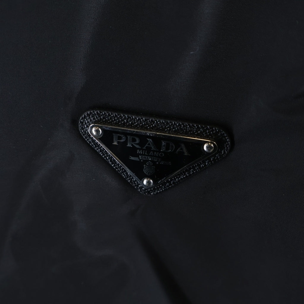 PRADA(プラダ) トライアングルロゴ ニット切替 ジップアップ ナイロンジャケット ブラック UMG116