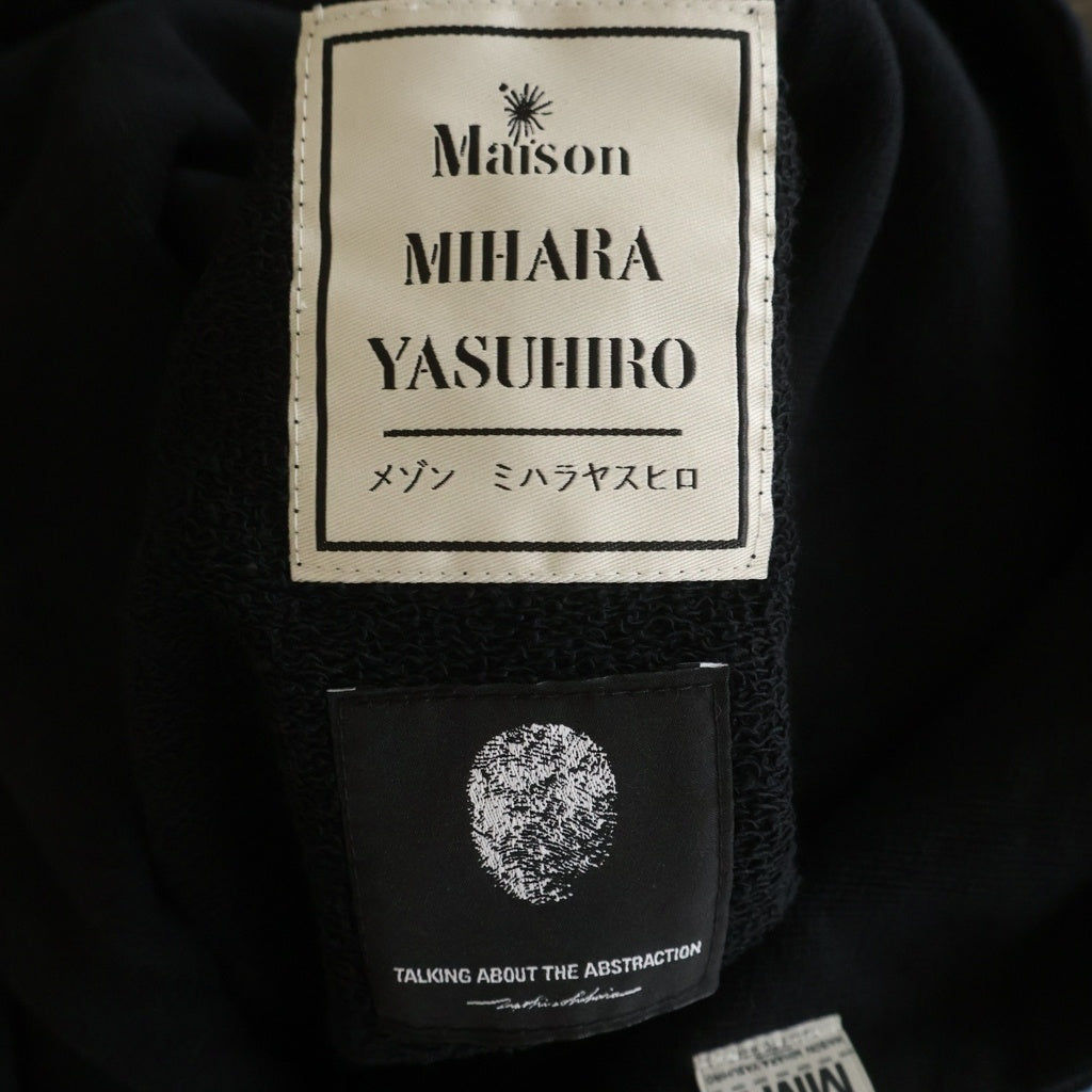 TALKING ABOUT THE ABSTRACTION(トーキング アバウト ザ アブストラクション) 25SS ×メゾンミハラヤスヒロ ハングオンショルダー プルオーバーパーカー フーディー ブラック NPT-MMYP-002