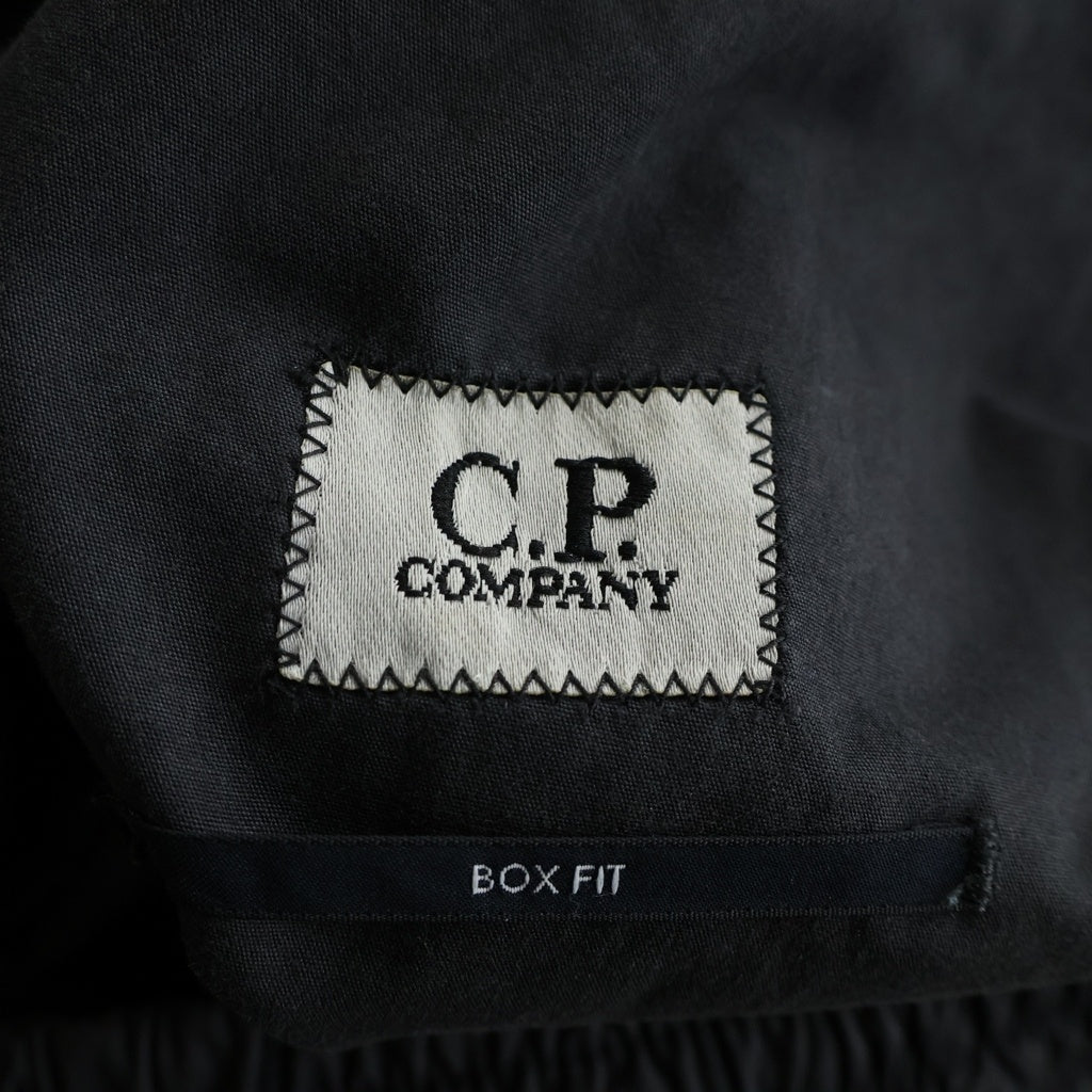 C.P. Company(シーピーカンパニー) ロゴパッチ コットン イージーカーゴパンツ ブラック 17CMPA178A-006134G