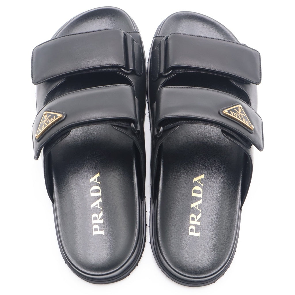 PRADA(プラダ) 25AW LEATHER SANDAL トライアングルロゴプレート ベルクロ ナッパレザーサンダル レディース ブラック 1XX755
