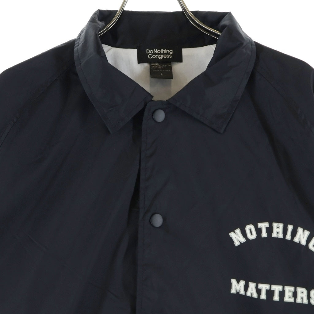 Do Nothing Congress(ドゥー ナッシング コングレス) COACH JACKET プリント スナップボタン コーチジャケット ブラック