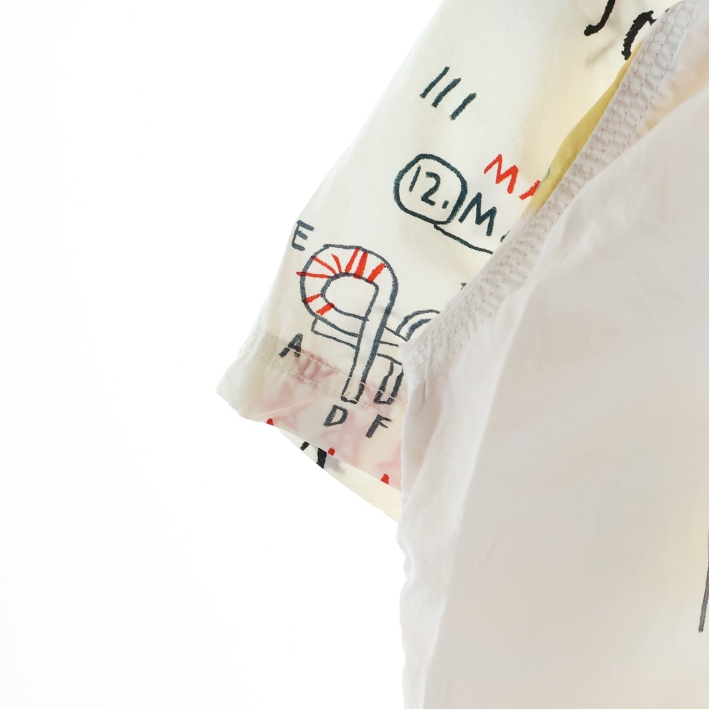 JUNYA WATANABE COMME des GARCONS(ジュンヤワタナベ コムデギャルソン) 23SS AD2022 ×JEAN-MICHEL BASQUIAT ジャンミシェルバスキア イラスト総柄 半袖コットンシャツ ホワイト WK-B025