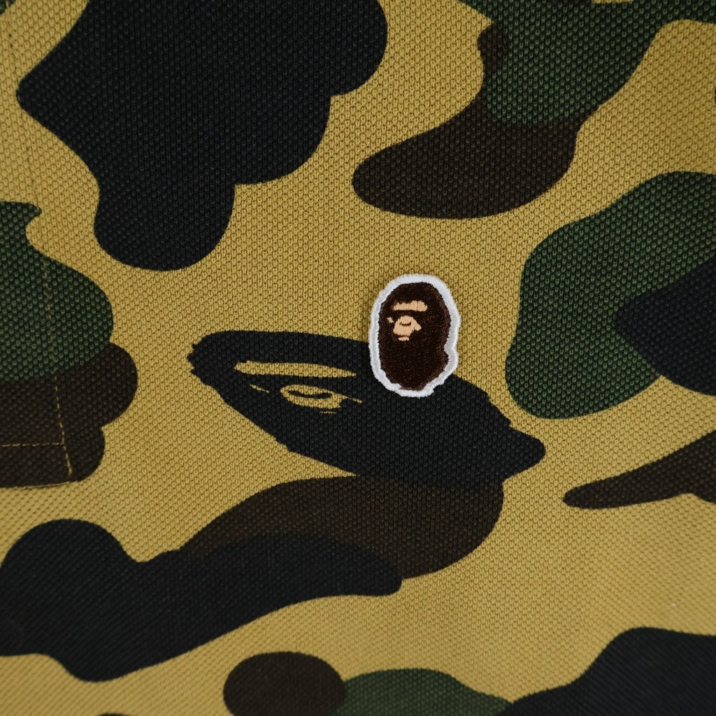 A BATHING APE(アベイシングエイプ) 1ST CAMO ONE POINT REGULAR FIT POLO SHIRT ファーストカモ ワンポイントロゴ 半袖ポロシャツ 迷彩 イエロー