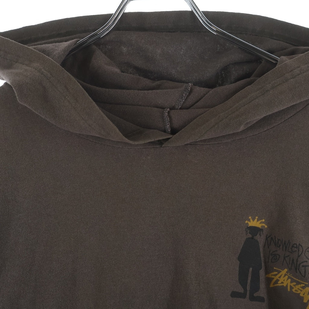 STUSSY(ステューシー) 80S VINTAGE KNOWLEDGE IS KING ヴィンテージ シャドーマン ノウレッジイズキング フーデッド長袖Tシャツ カットソー ブラウン
