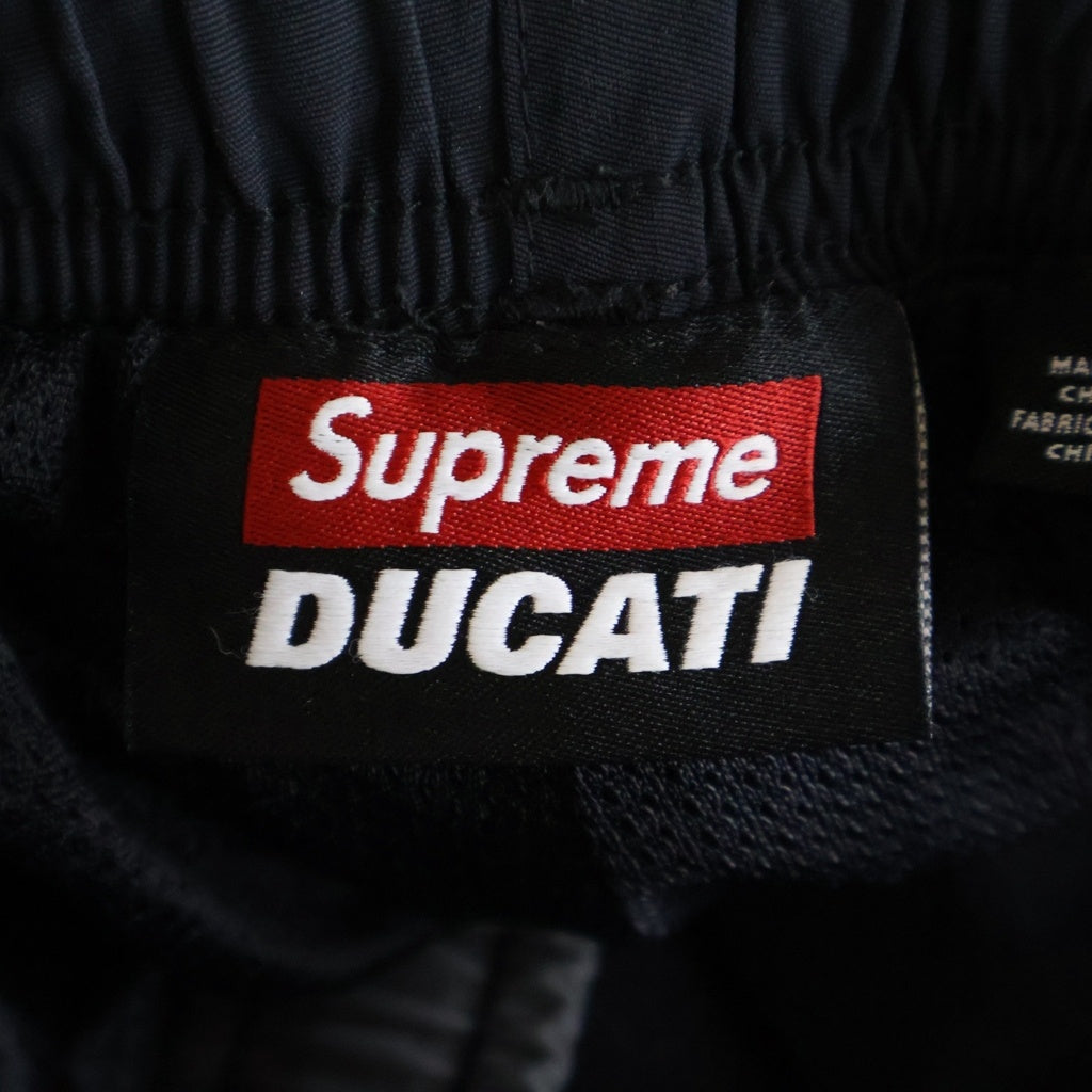 SUPREME(シュプリーム) 24SS ×DUCATI Track Pant ドゥカティ トラック ロゴ エンブロイダリー ワッペン ナイロン パンツ ブラック