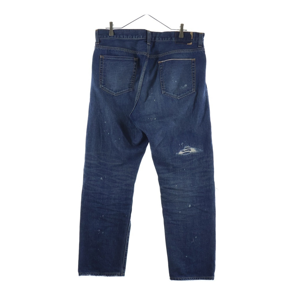 UNIFORM EXPERIMENT(ユニフォームエクスペリメント) 25AW DAMAGED DENIM TAPERED-FIT JEANS テーパードフィット ジップフライダメージデニムパンツ インディゴ UE-252055