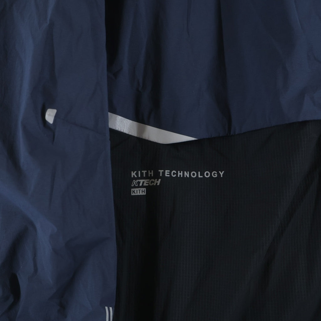 KITH(キス) 26SS ×ON CORE JACKET MIDNIGHT オン コア ミッドナイト ジップアップ フーデッド ナイロンジャケット ブルー 1MG11370688