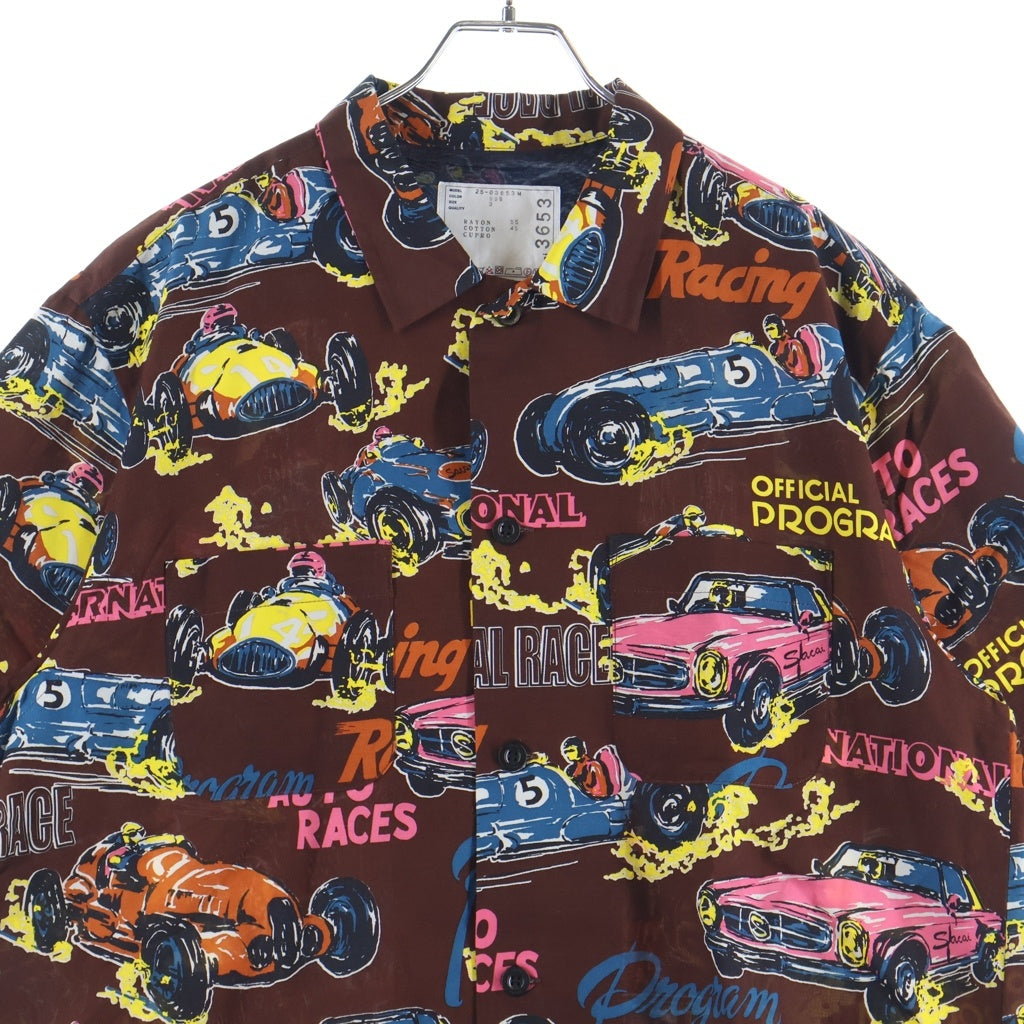 Sacai(サカイ) 25SS CAR RACE TROPICAL PRINT SHIRT カーレース トロピカル 総プリント 半袖 オープンカラーシャツ ブラウン 25-03653M