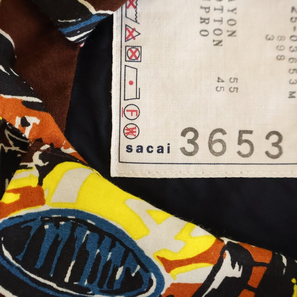 Sacai(サカイ) 25SS CAR RACE TROPICAL PRINT SHIRT カーレース トロピカル 総プリント 半袖 オープンカラーシャツ ブラウン 25-03653M