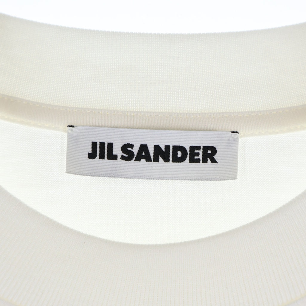 JIL SANDER(ジルサンダー) 26AW L/S T-SHIRTS バーティカルロゴプリント コットンジャージー クルーネック 長袖Tシャツ カットソー ホワイト J22GC0278