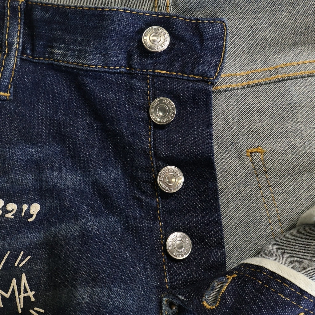 DSQUARED2(ディースクエアード) 22SS GRAFFITI SKATER JEAN グラフィティ スケーター ペイント加工 ボタンフライ スリムフィットジーンズ デニムパンツ インディゴ S74LB1099
