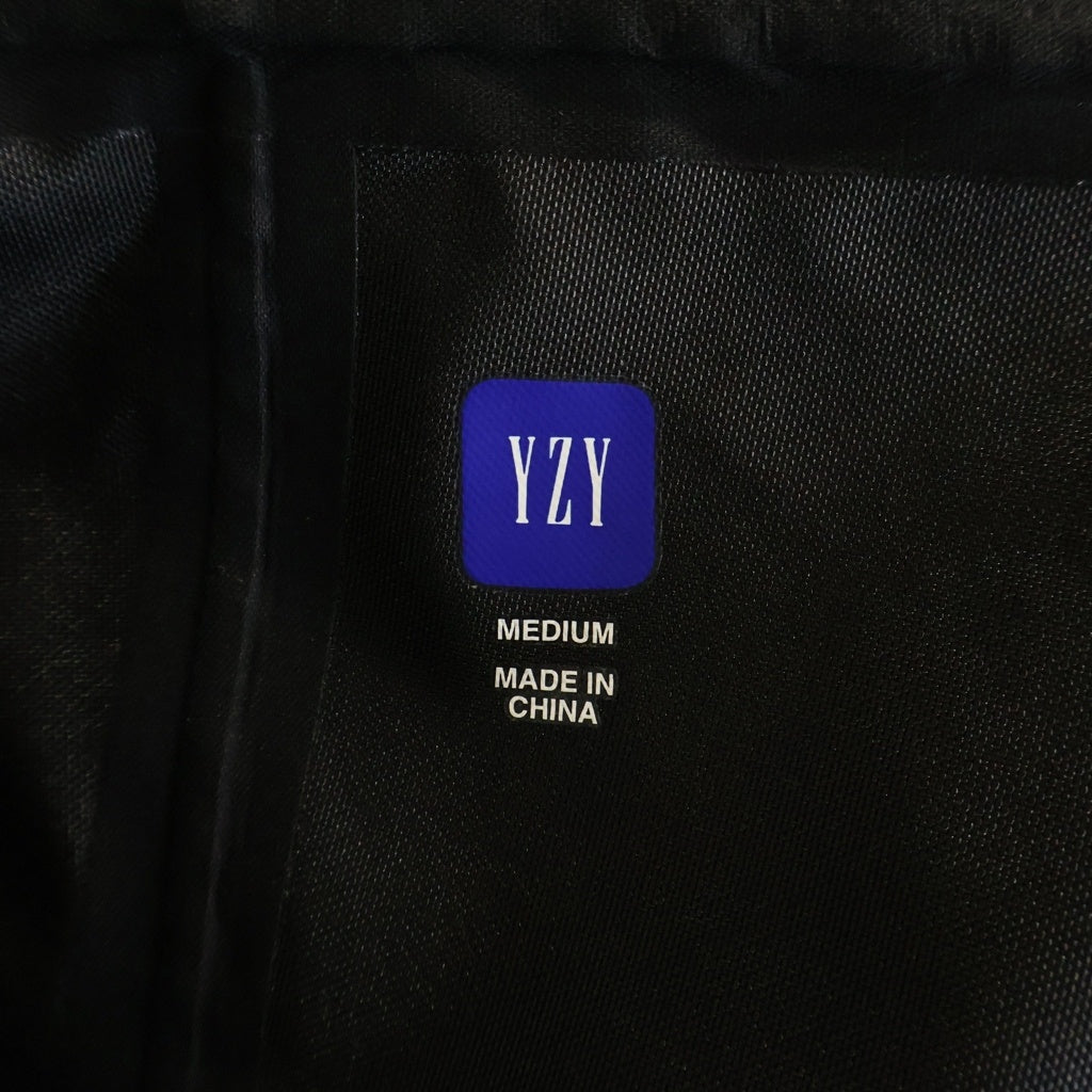 Yeezy Gap Engineered by Balenciaga(イージー ギャップ エンジニアードバイ バレンシアガ) ナイロン コーチジャケット フーデッド Tカットパーカー ブラック 471273-00-1