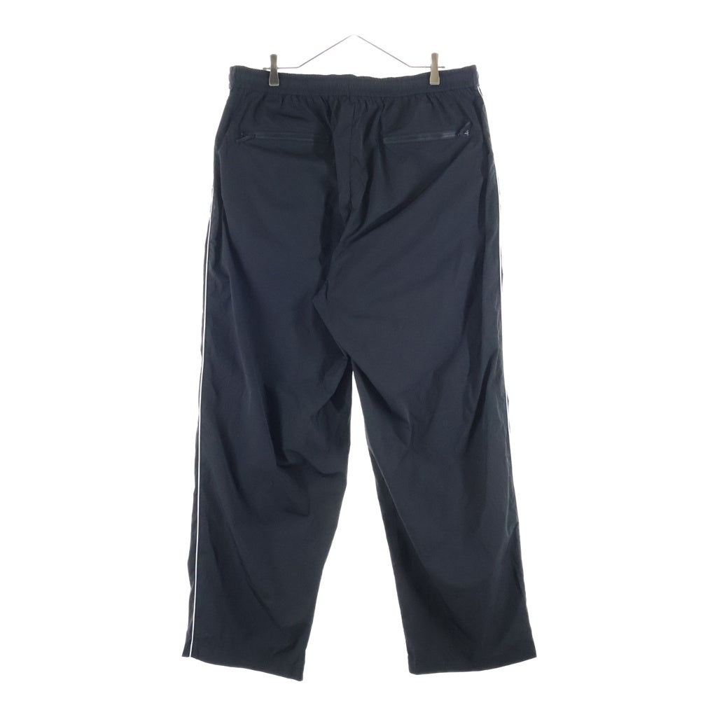 The Ennoy Professional(エンノイプロフェッショナル) 26SS PIPING NYLON TRACK PANTS パイピング ナイロントラックパンツ ブラック SS26BRENPT01LP