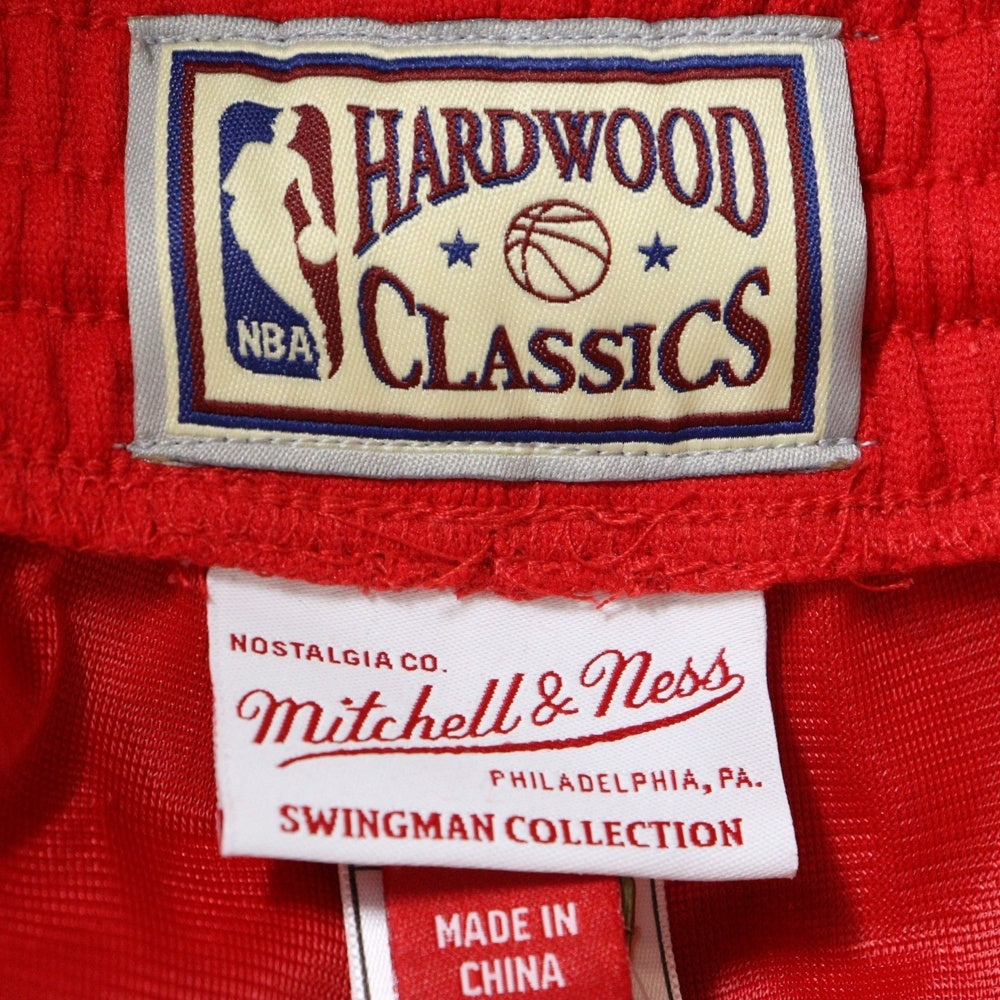 Mitchell&Ness(ミッチェル アンド ネス) 23SS NBA SWINGMAN ROAD SHORTS BULLS 97-98 スウィングマン ロード ブルズ ハーフパンツ ショーツ レッド/ブラック SMSHGS18223-CBUSCAR97