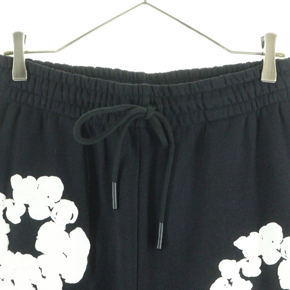 DENIM TEARS(デニムティアーズ) ×READYMADE COTTON WREATH SWEAT FLARE PANTS コットンリース 総柄フラワー カットオフ フレア スウェットパンツ ブラック RE-DT-BK-00-00-09
