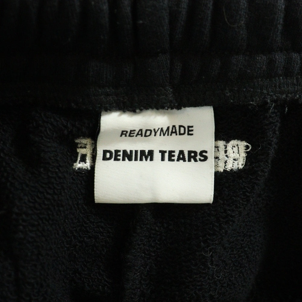 DENIM TEARS(デニムティアーズ) ×READYMADE COTTON WREATH SWEAT FLARE PANTS コットンリース 総柄フラワー カットオフ フレア スウェットパンツ ブラック RE-DT-BK-00-00-09