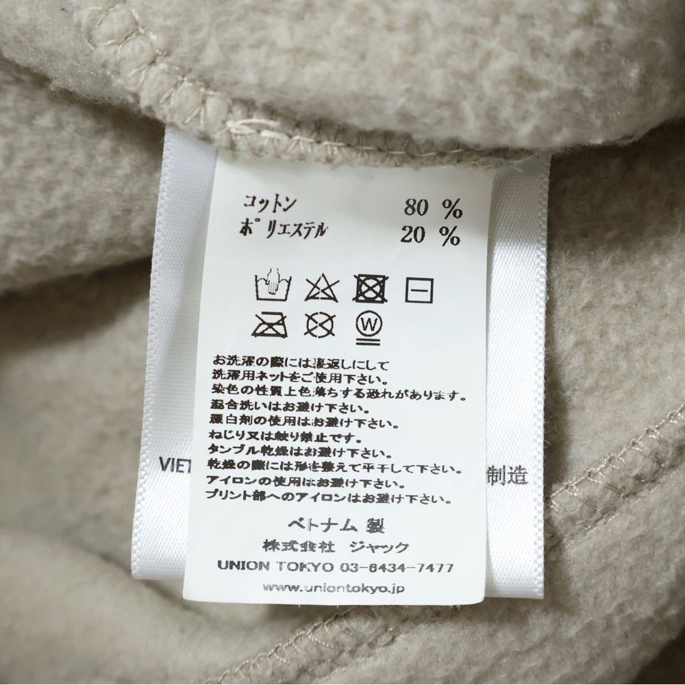 FEAR OF GOD ESSENTIALS(フィアオブゴッド エッセンシャルズ) フロントラバーロゴ スウェット ジョガー ロングパンツ ベージュ