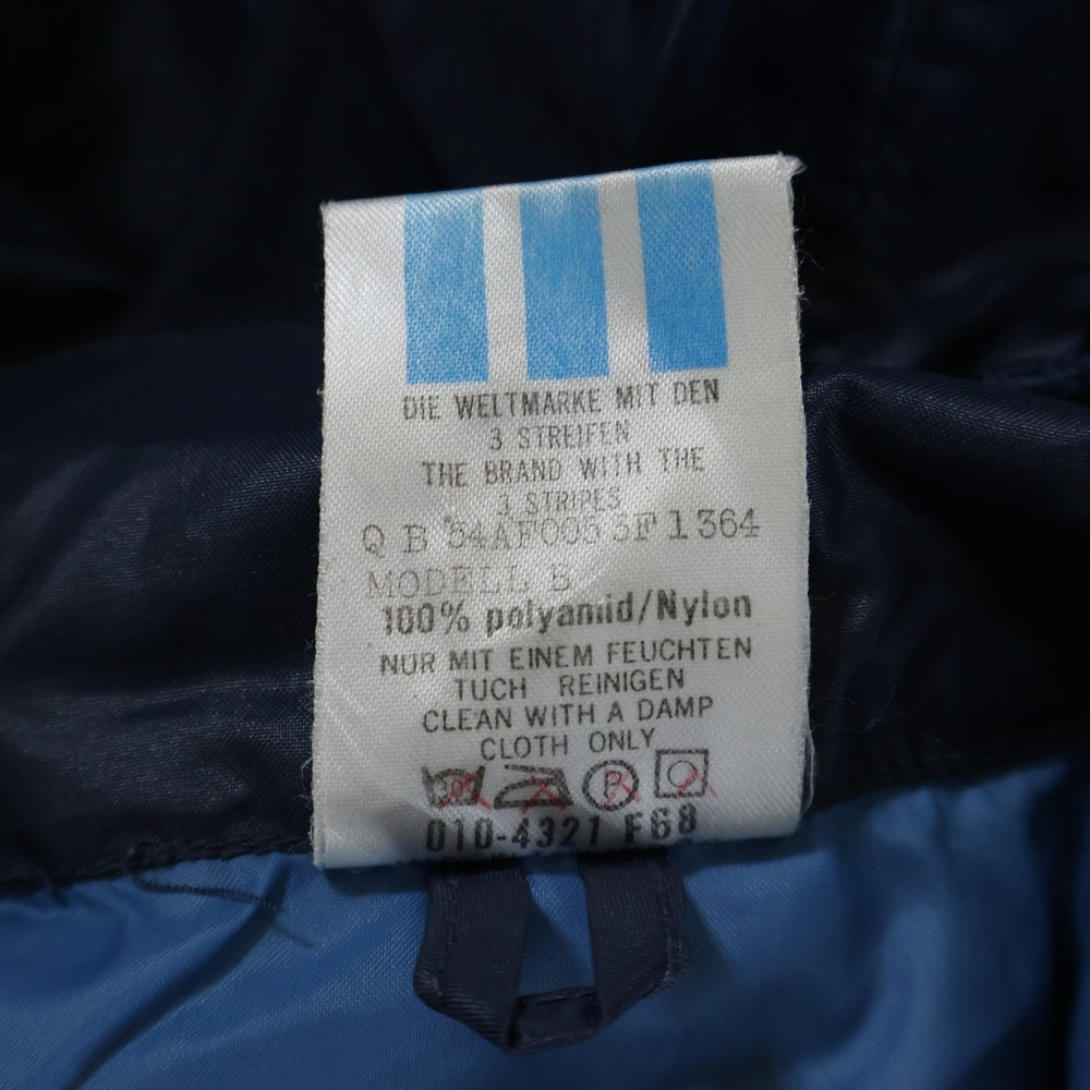 adidas Originals(アディダスオリジナルス) 80S VINTAGE ヴィンテージ 万国旗タグ トレフォイルロゴプリント ジップアップ フーデッドナイロンジャケット ブルー/ネイビー