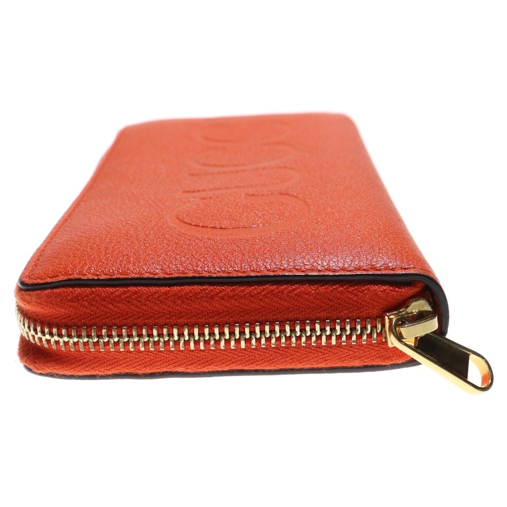 GUCCI(グッチ) ロゴエンボス ラウンドジップ レザー ロングウォレット 長財布 オレンジ 658691 レディース