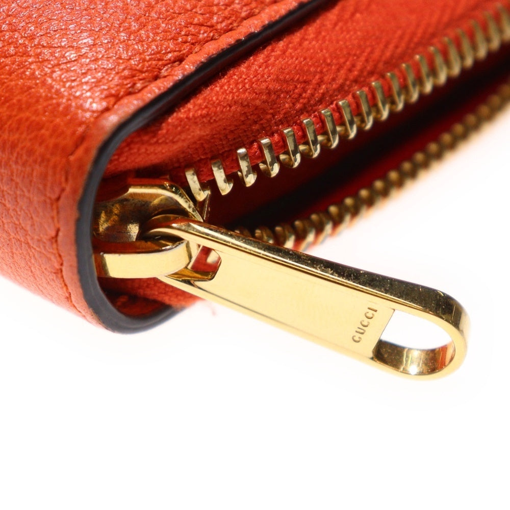 GUCCI(グッチ) ロゴエンボス ラウンドジップ レザー ロングウォレット 長財布 オレンジ 658691 レディース